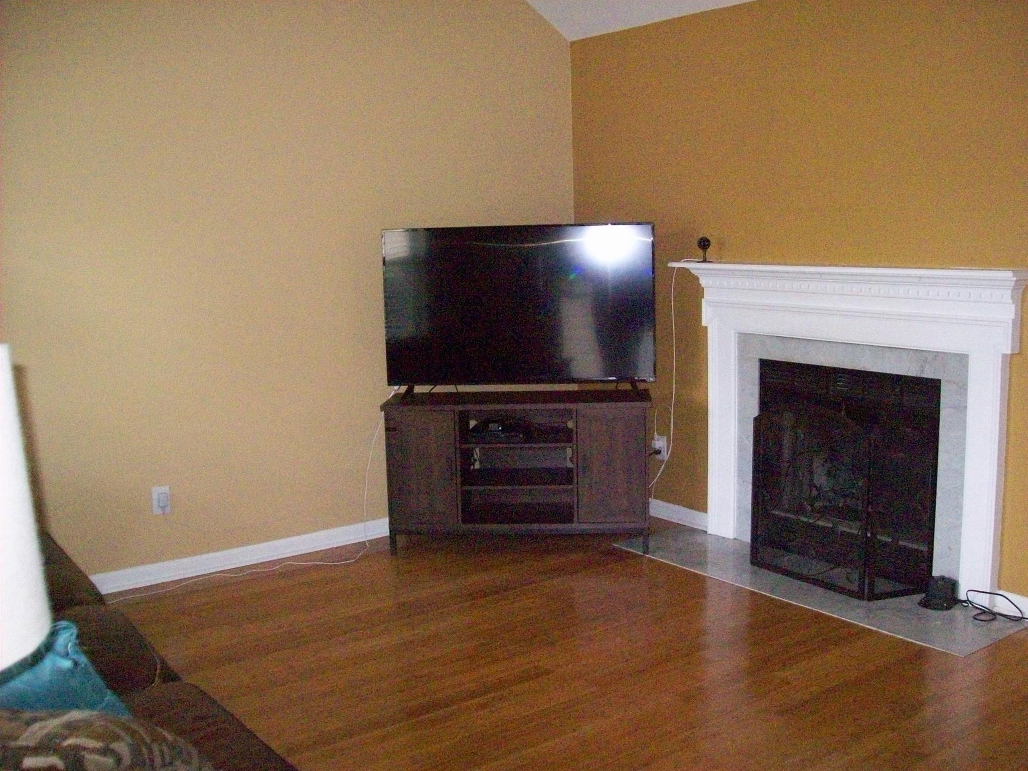 3637 Rutherford Drive Spring Hill, TN 37174 - Photo 7 of 25 a living room with furniture and a fireplace
