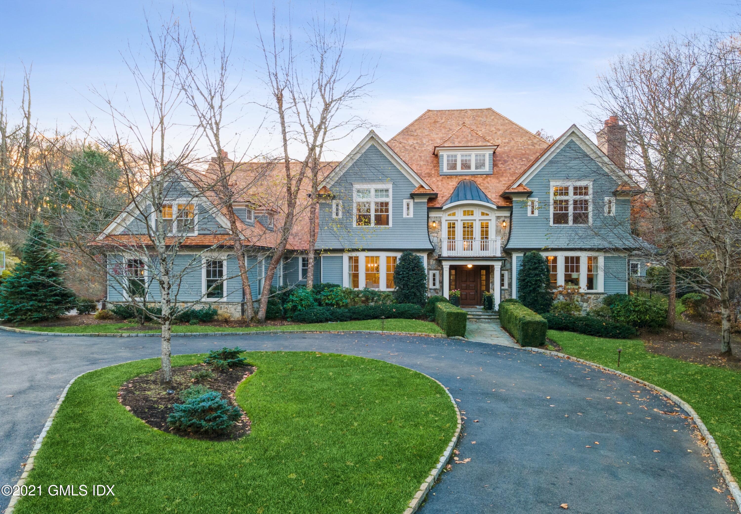 3 Hycliff Road Greenwich, CT 06831 - Photo 1 of 31 a front view of a house with a garden