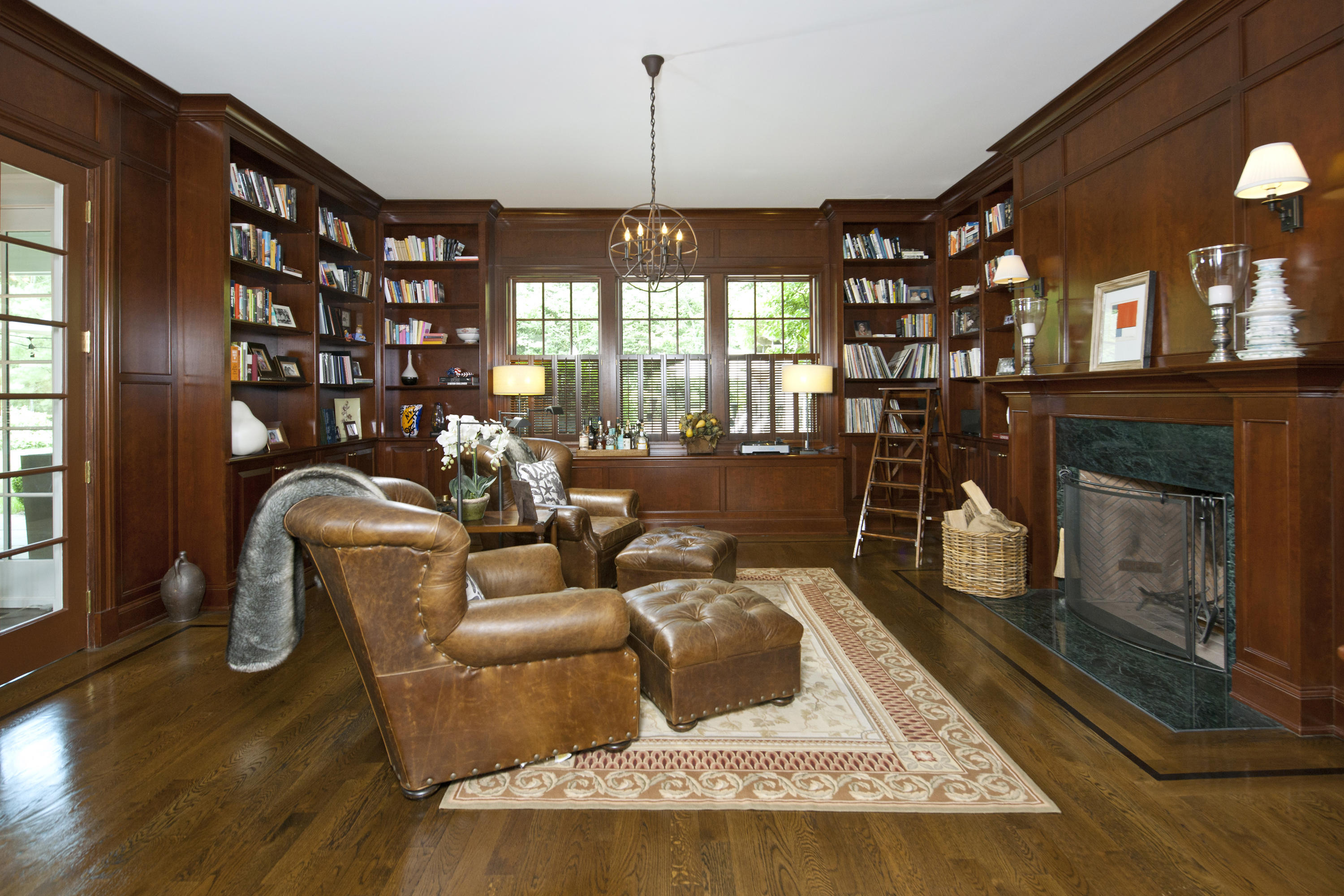 3 Hycliff Road Greenwich, CT 06831 - Photo 12 of 31 a living room with furniture fireplace and a large window