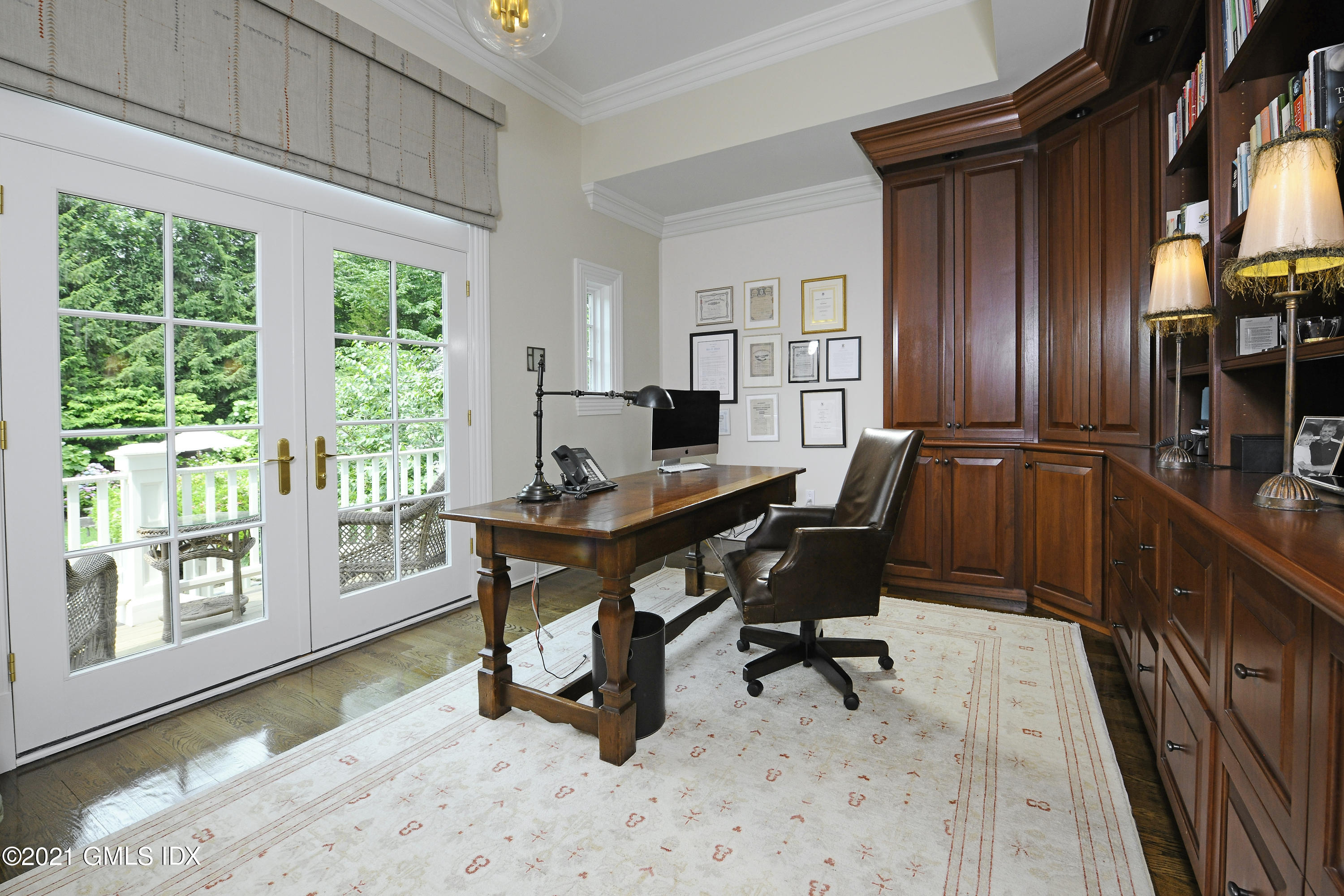 3 Hycliff Road Greenwich, CT 06831 - Photo 15 of 31 a view of a workspace with furniture and a window