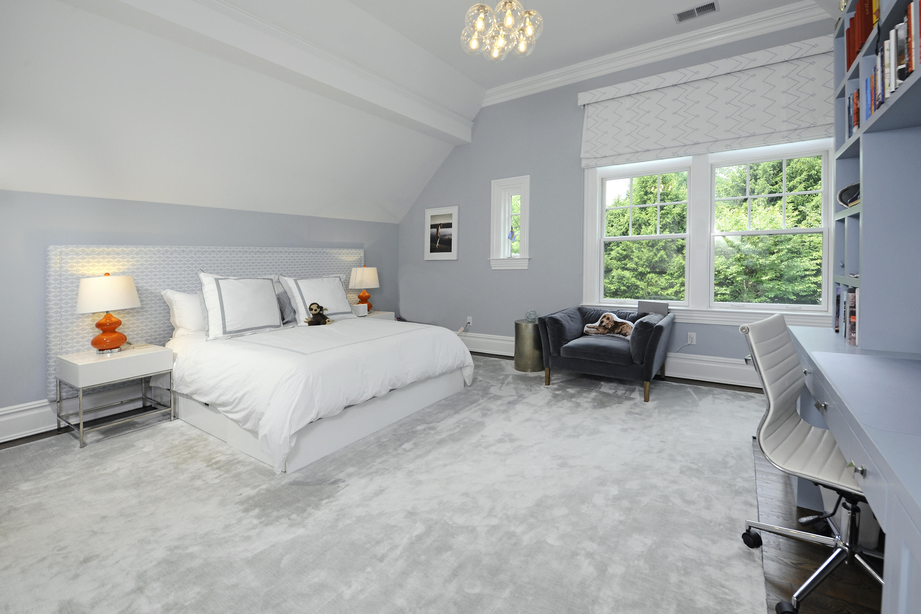 3 Hycliff Road Greenwich, CT 06831 - Photo 16 of 31 a bedroom with a bed a table and a couch