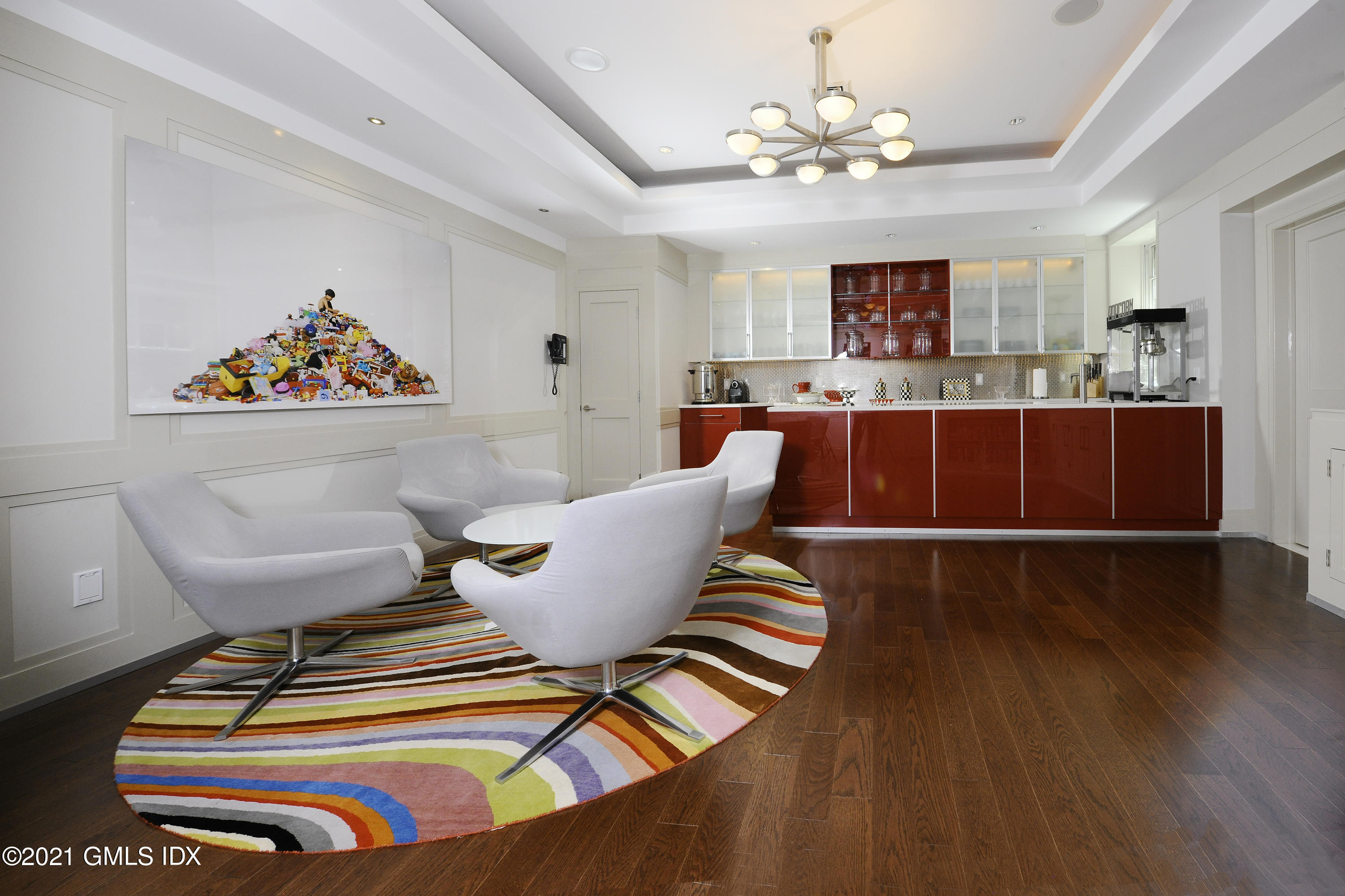 3 Hycliff Road Greenwich, CT 06831 - Photo 20 of 31 a living room with furniture and a chandelier