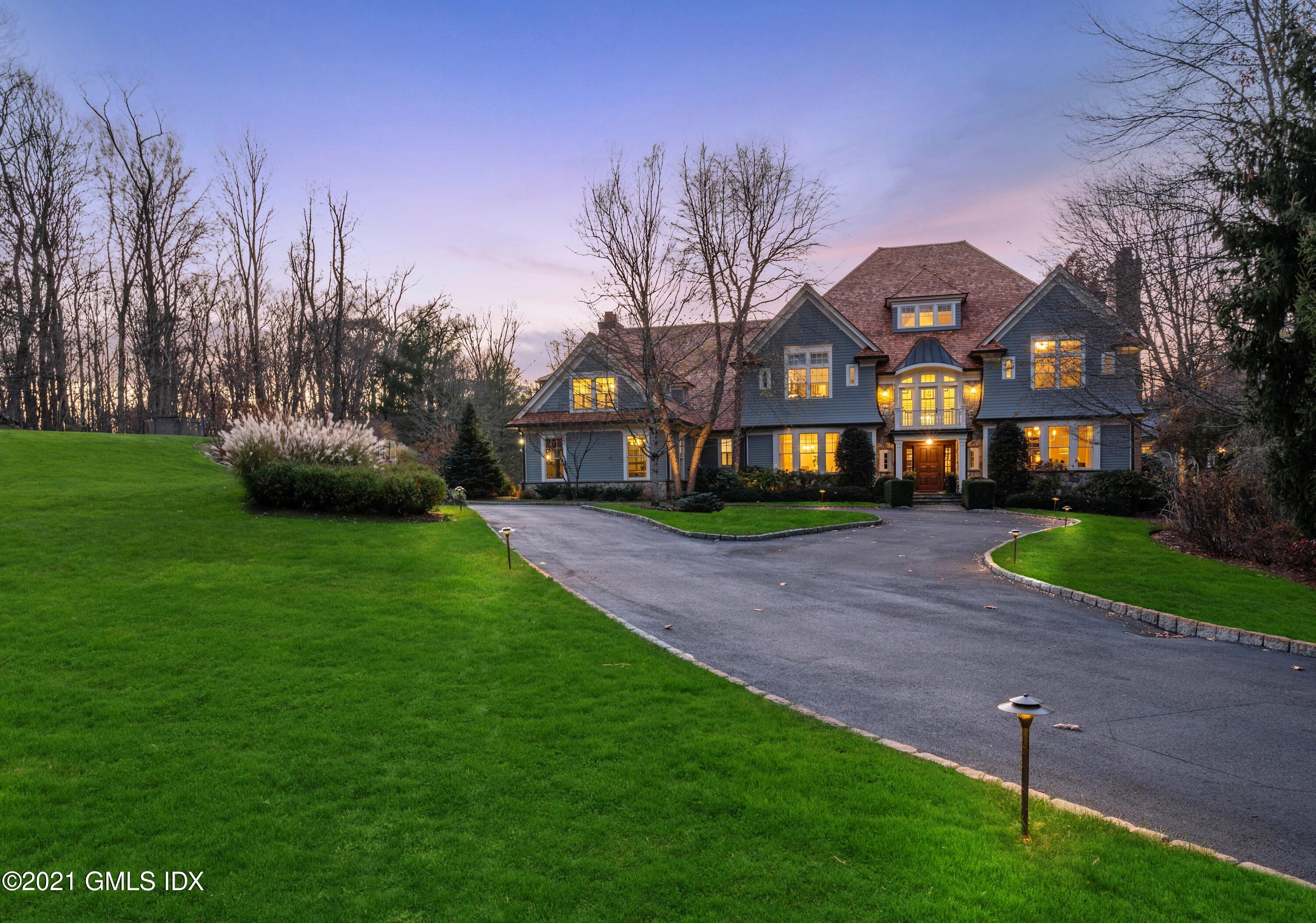 3 Hycliff Road Greenwich, CT 06831 - Photo 2 of 31 a front view of a house with a garden