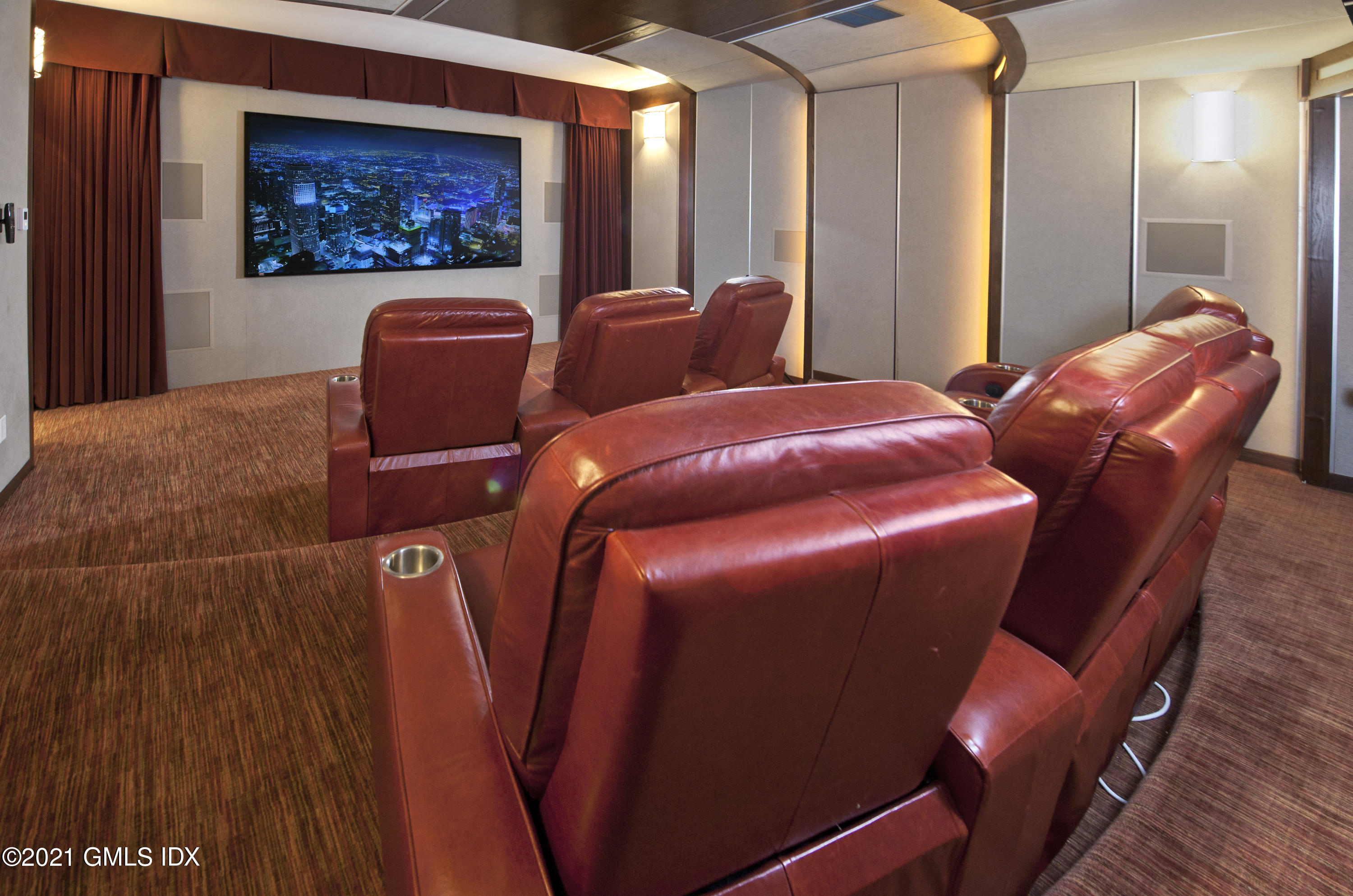 3 Hycliff Road Greenwich, CT 06831 - Photo 21 of 31 a room with chairs projector and screen