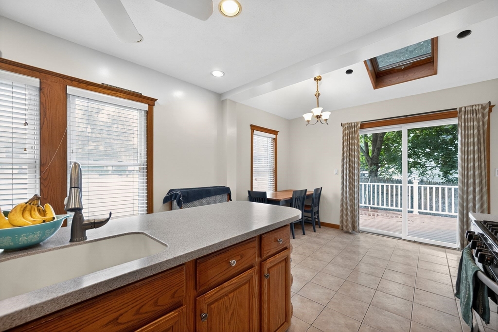 8 Corthell Road North Billerica, MA 01862 - Photo 8 of 28 a kitchen with a sink and large window