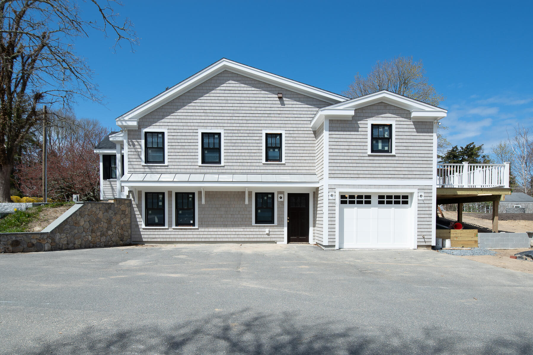 86 West Road Orleans, MA 02653 - Photo 5 of 15 a front view of a house with a yard