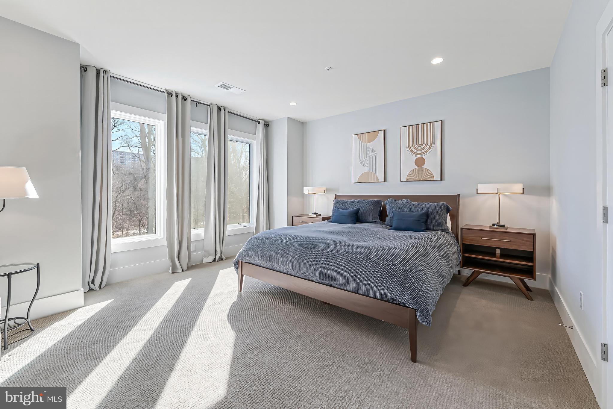 5348 Merriam Street Bethesda, MD 20814 - Photo 24 of 39 Serene bedroom with natural light and art.