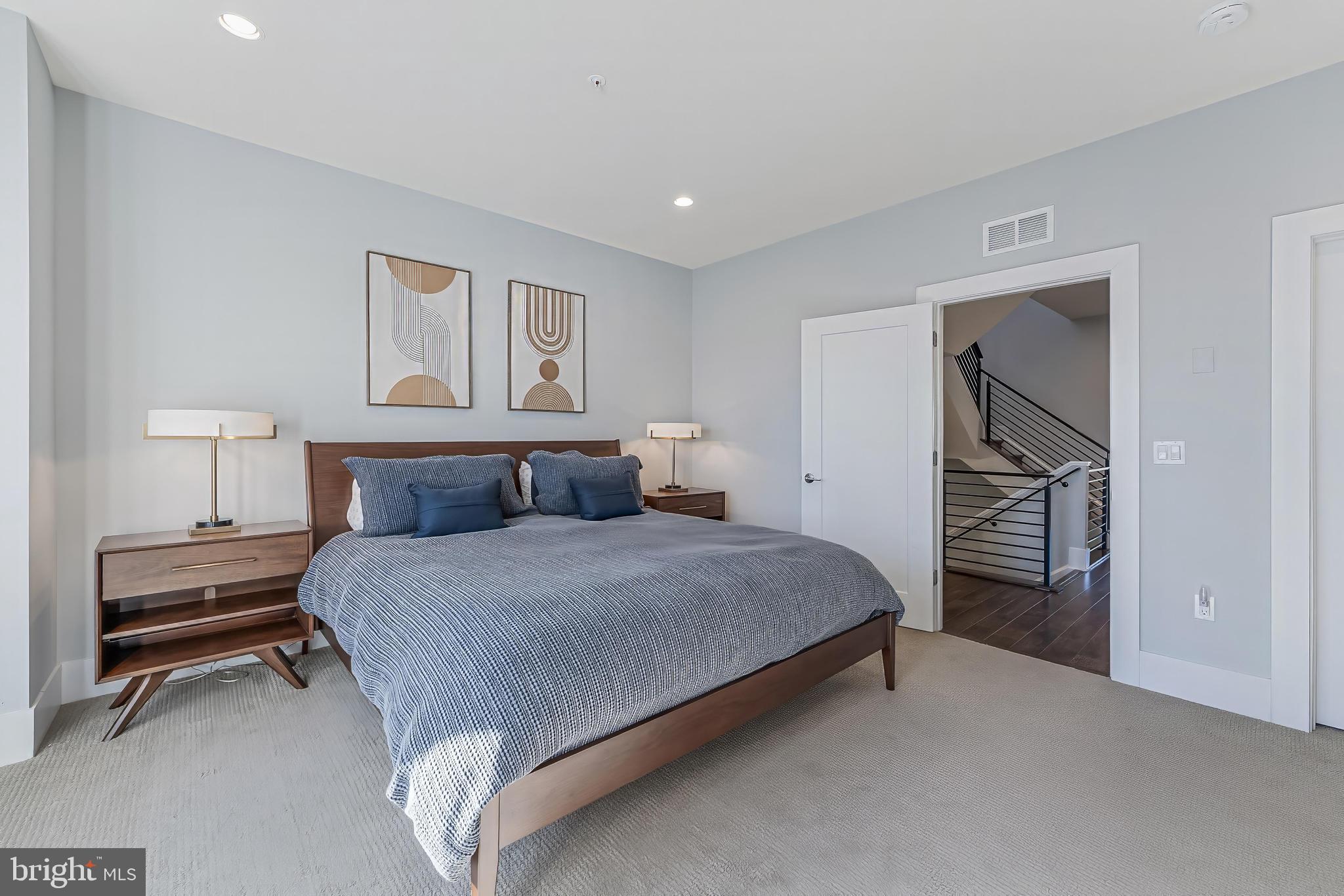 5348 Merriam Street Bethesda, MD 20814 - Photo 25 of 39 Serene bedroom with modern decor and light.