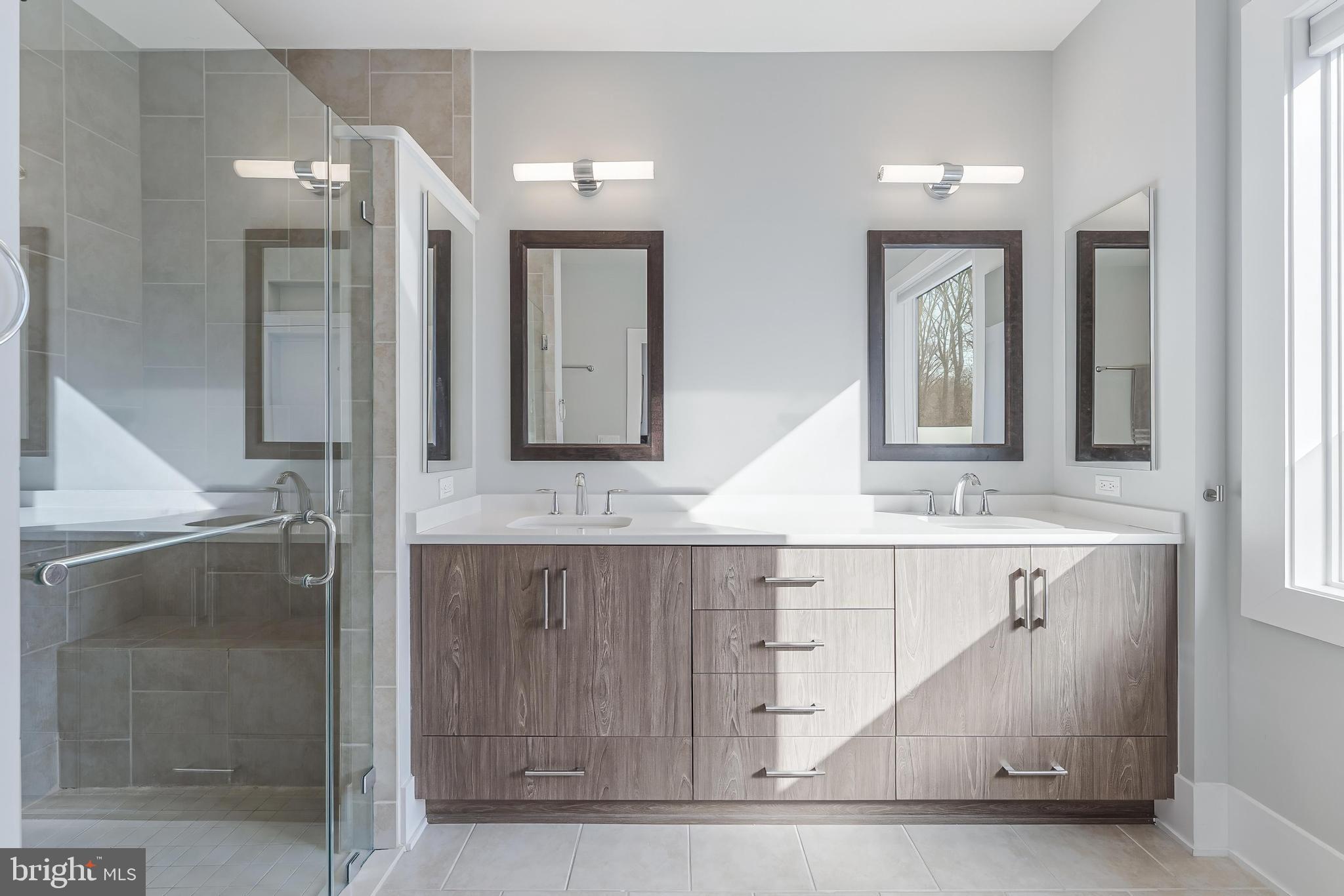5348 Merriam Street Bethesda, MD 20814 - Photo 25 of 39 Sleek modern bathroom with natural light.