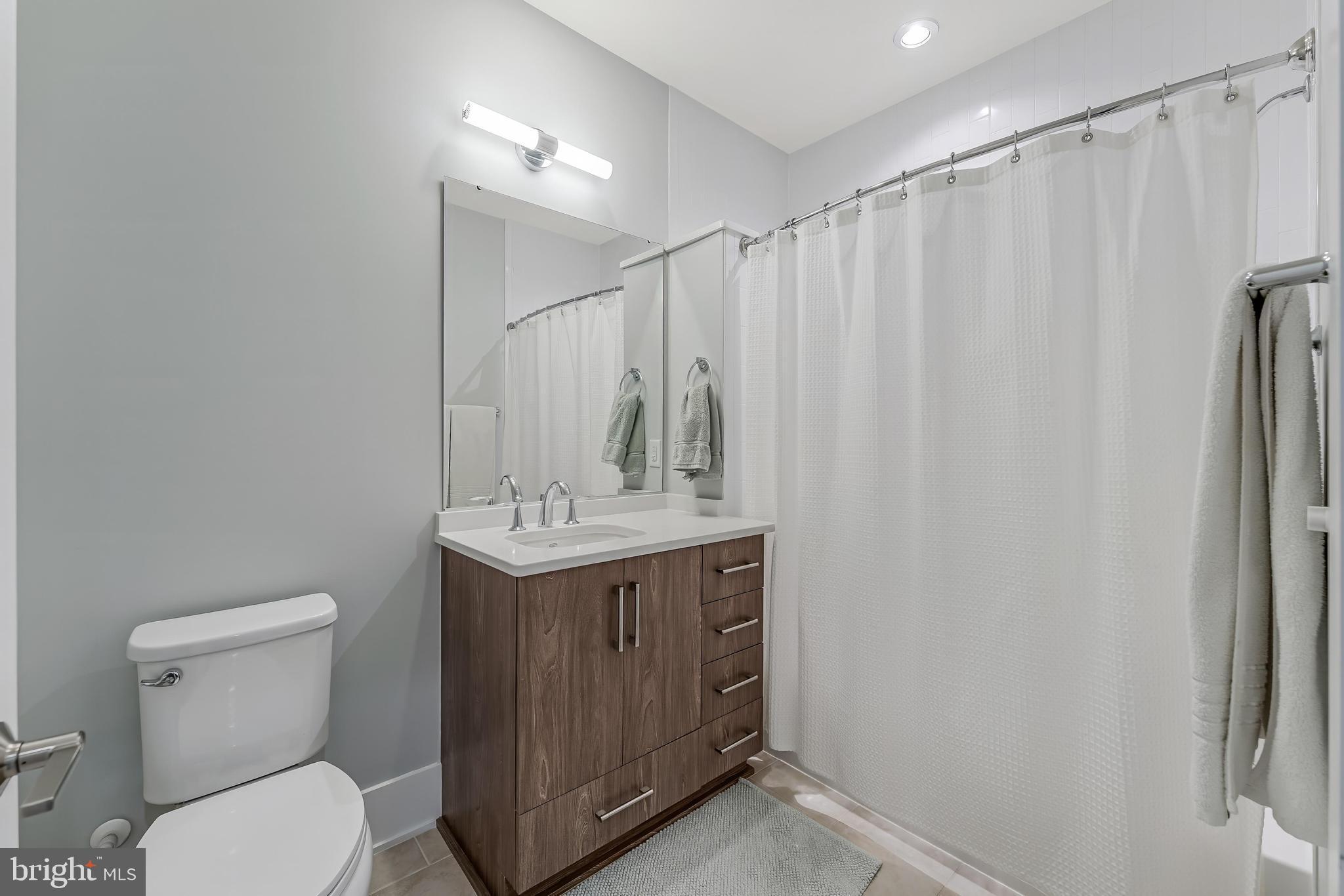5348 Merriam Street Bethesda, MD 20814 - Photo 31 of 39 Modern bathroom with sleek finishes.