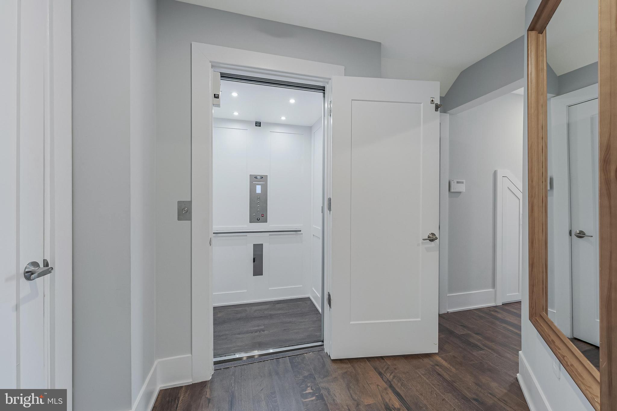 5348 Merriam Street Bethesda, MD 20814 - Photo 32 of 39 Modern elevator access in stylish foyer.