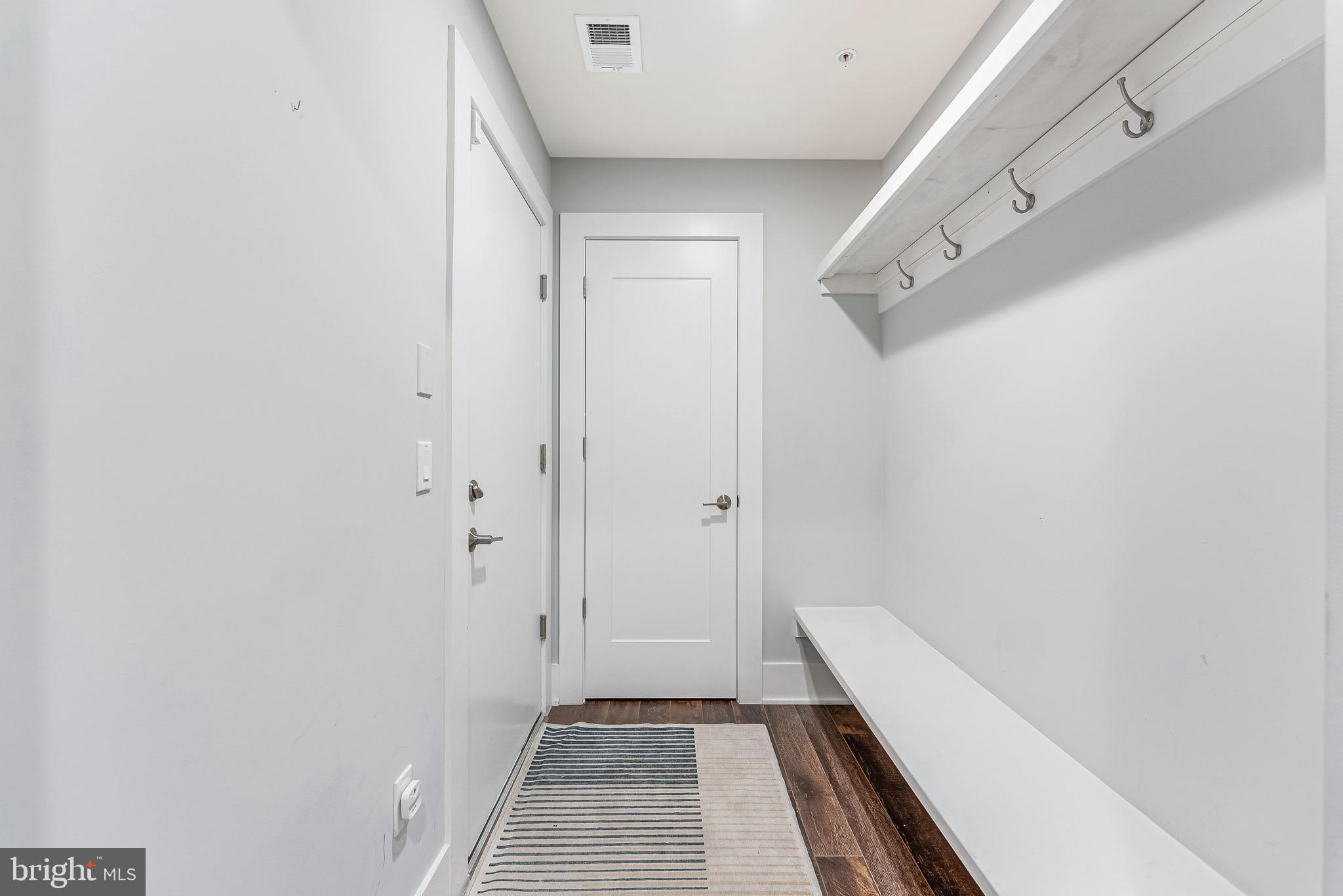 5348 Merriam Street Bethesda, MD 20814 - Photo 34 of 39 Modern entryway with sleek design elements.