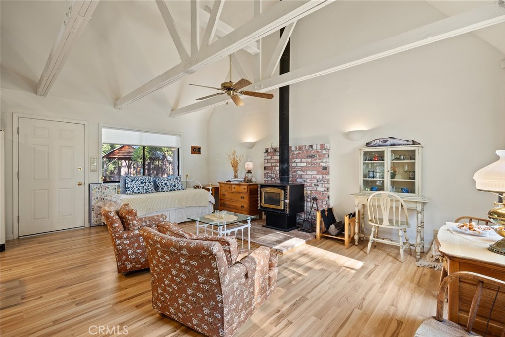 8002 Humboldt Road Butte Meadows, CA 95942 - Photo 10 of 47 a living room with furniture and a wooden floor