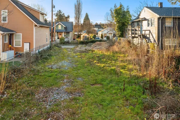 a view of a town with barn house