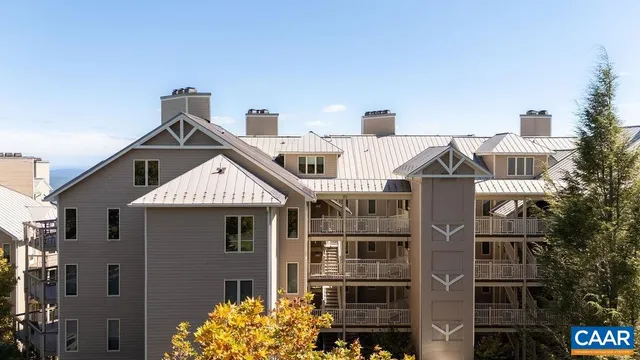 a view of a building with a yard