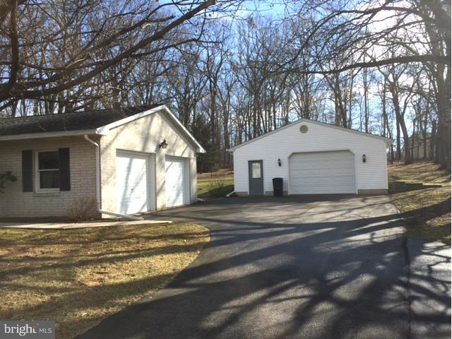 5095 Grave Run Road Manchester, MD 21102 - Photo 2 of 17 a view of white house with a yard