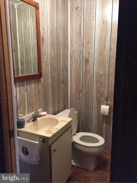 5095 Grave Run Road Manchester, MD 21102 - Photo 13 of 17 a bathroom with a sink a toilet and a mirror