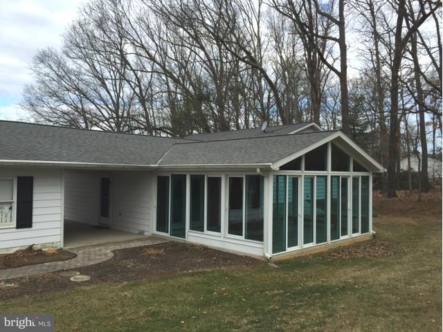 5095 Grave Run Road Manchester, MD 21102 - Photo 15 of 17 a front view of a house with a garage