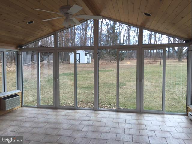 5095 Grave Run Road Manchester, MD 21102 - Photo 6 of 17 a view of an empty room with a large window