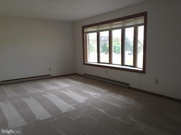 5095 Grave Run Road Manchester, MD 21102 - Photo 7 of 17 a view of an empty room with a window