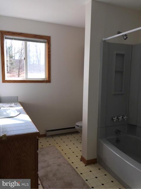 5095 Grave Run Road Manchester, MD 21102 - Photo 9 of 17 a bathroom with a bathtub and a window