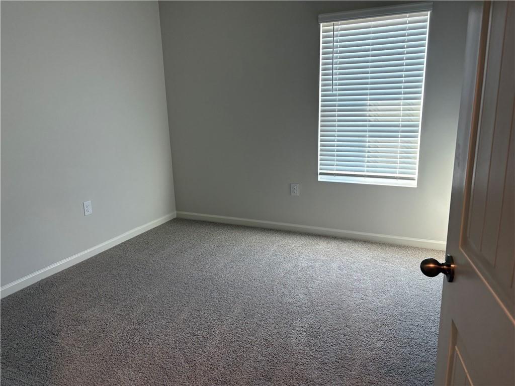 30 Rustin Ridge Dahlonega, GA 30533 - Photo 9 of 12 an empty room with a window