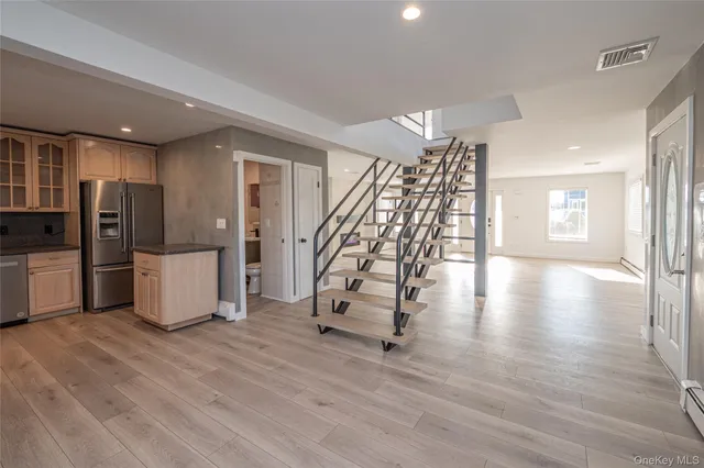 a view of a balcony with wooden floor