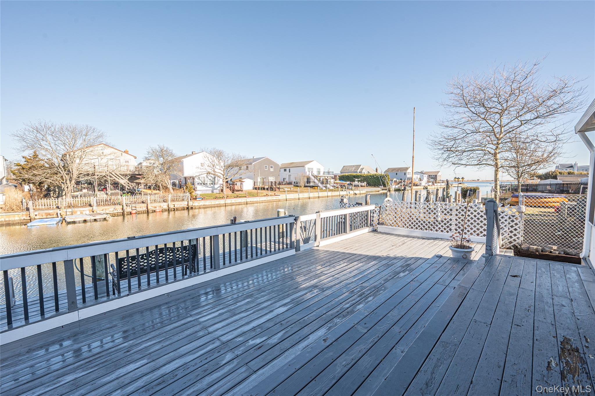 15 Roneck Court Shirley, NY 11967 - Photo 39 of 44 a view of roof deck with patio