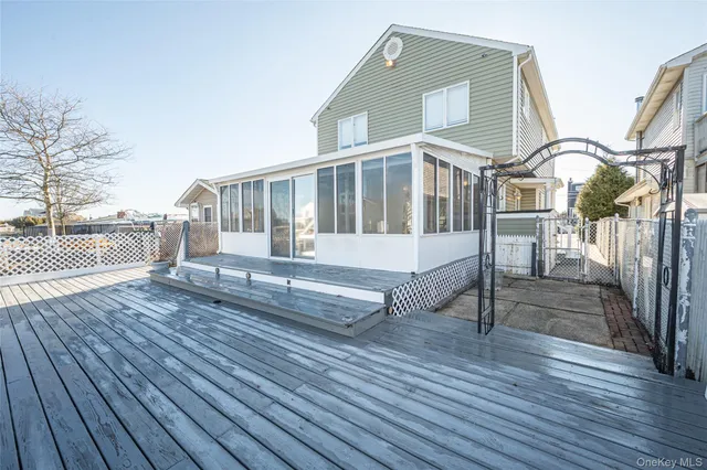 a view of roof deck with patio