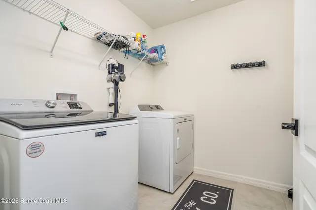 a bathroom with a sink and vanity