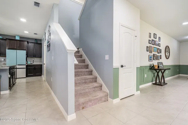a view of a kitchen with furniture and a kitchen