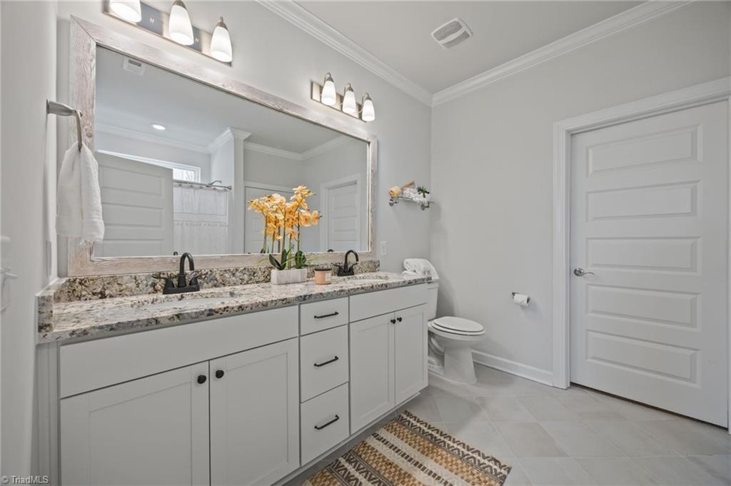 1935 Channel Street Graham, NC 27253 - Photo 18 of 26 Primary Bath