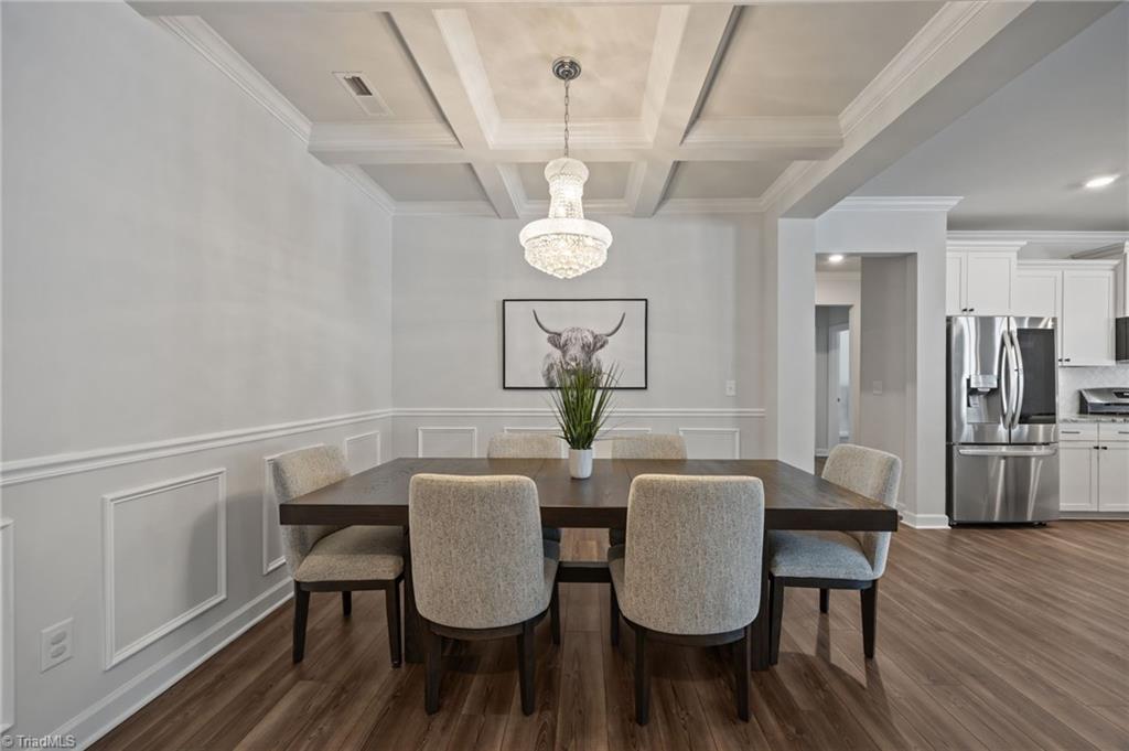 1935 Channel Street Graham, NC 27253 - Photo 10 of 26 Dining Room w/wainscoting & coffered ceiling