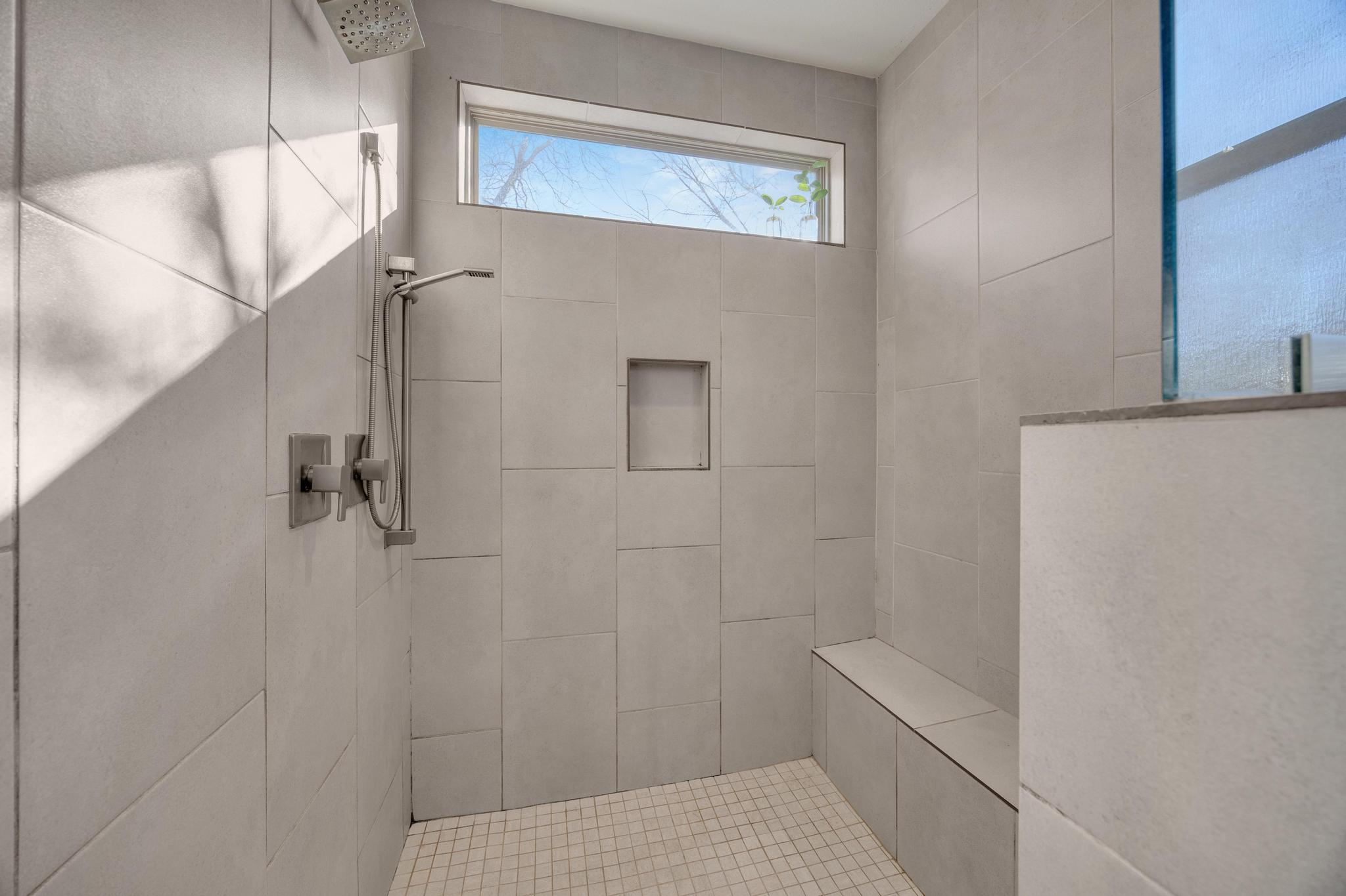 4404 Clarkson Avenue Austin, TX 78751 - Photo 16 of 35 a bathroom with a shower and a sink