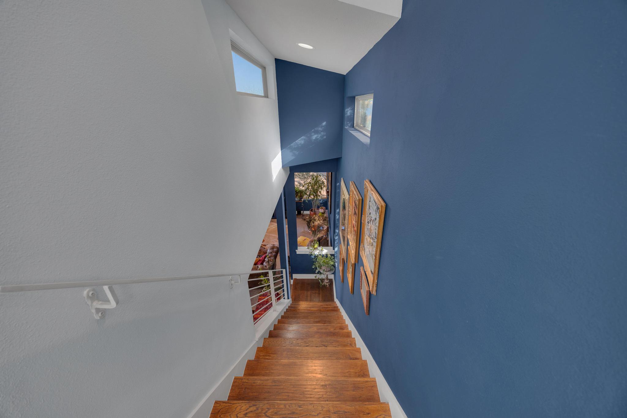 4404 Clarkson Avenue Austin, TX 78751 - Photo 23 of 35 a view of a hallway with wooden floor