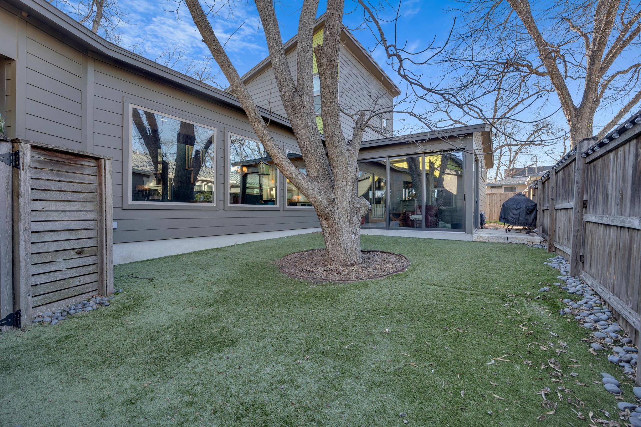 4404 Clarkson Avenue Austin, TX 78751 - Photo 25 of 35 a front view of a house with garden