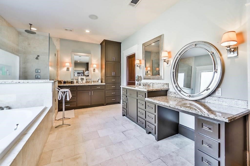 1436 Harvard Street Houston, TX 77008 - Photo 14 of 18 a large bathroom with a large tub and sink