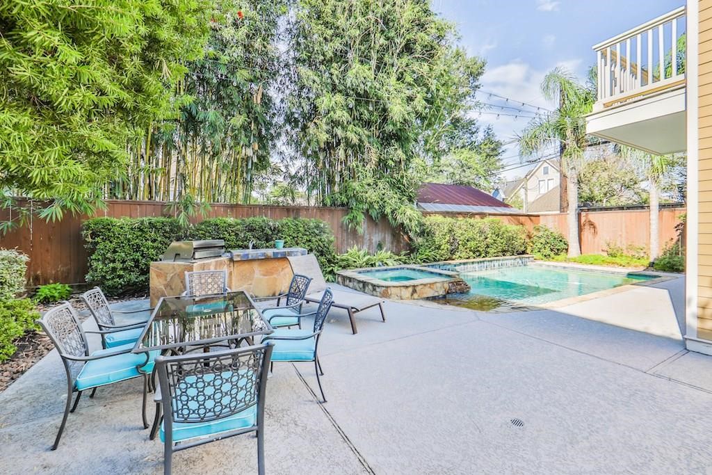 1436 Harvard Street Houston, TX 77008 - Photo 3 of 18 a view of swimming pool with outdoor seating and plants