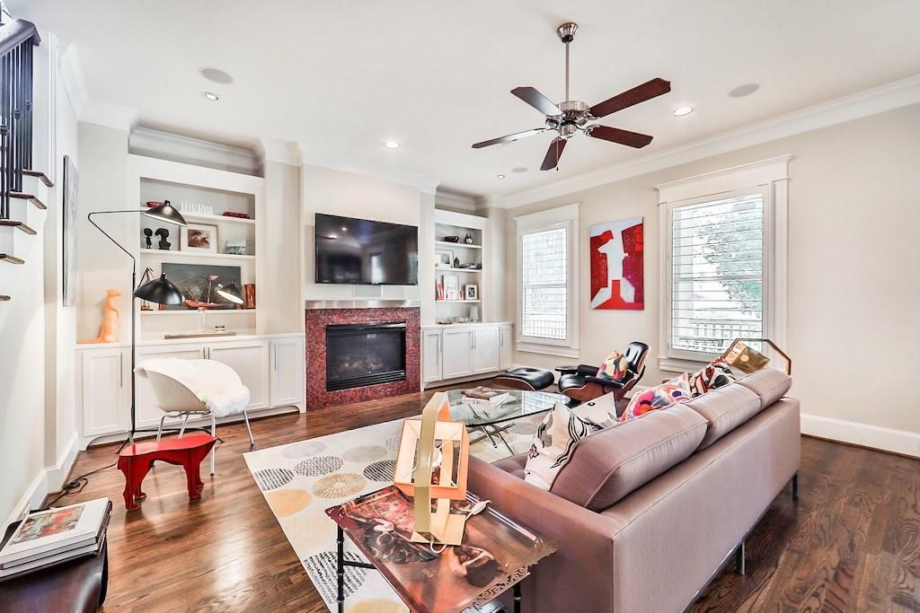 1436 Harvard Street Houston, TX 77008 - Photo 6 of 18 a living room with furniture fireplace and flat screen tv