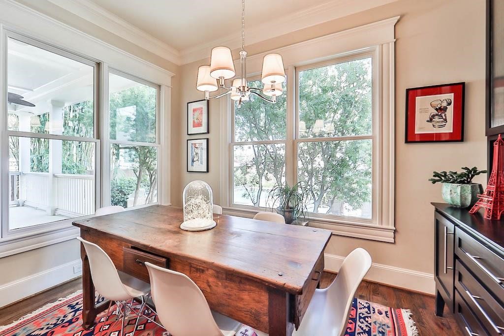 1436 Harvard Street Houston, TX 77008 - Photo 10 of 18 a dining room with furniture and wooden floor