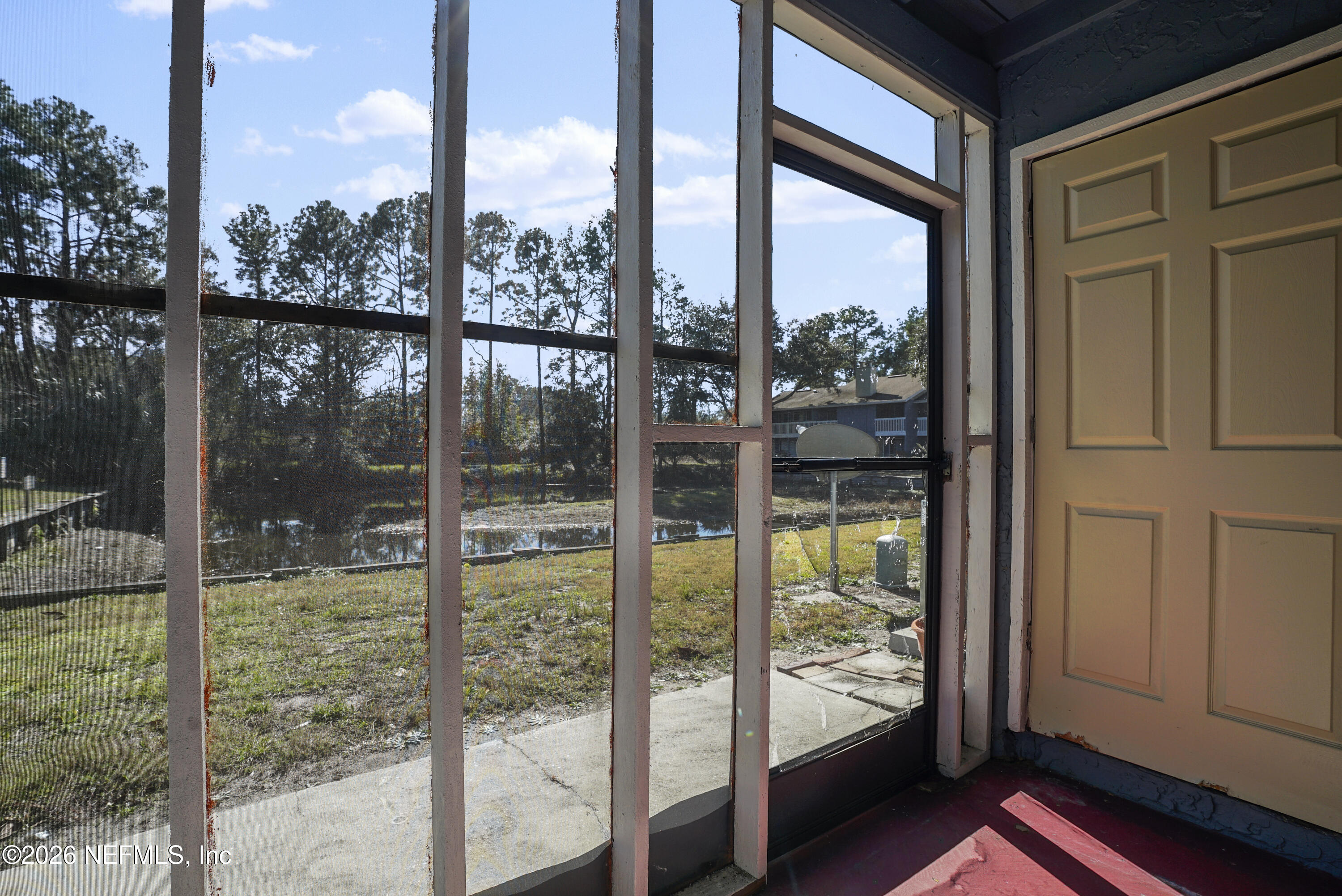 3517 Peeler Road, Unit 23 Jacksonville, FL 32277 - Photo 22 of 24 a view of a room with window