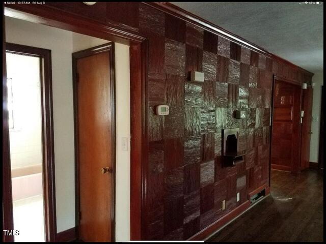 2346 Wade Avenue Raleigh, NC 27607 - Photo 7 of 20 a bathroom with a glass shower door