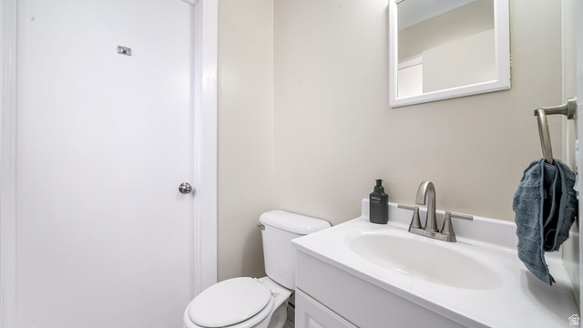 359 East 8400th Street South Sandy, UT 84070 - Photo 13 of 35 Bathroom featuring vanity and toilet