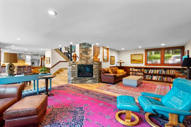 a bedroom with a bed and a couch