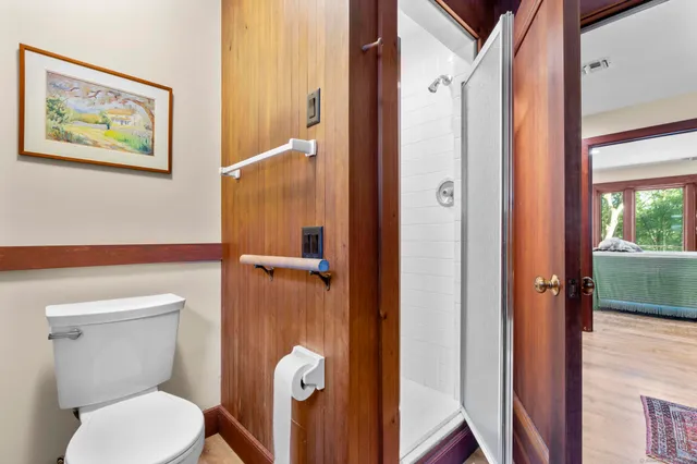 a bathroom with a bathtub and a shower