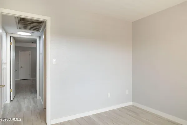 a bathroom with a sink toilet and mirror