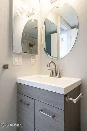 a bathroom with a bathtub and shower