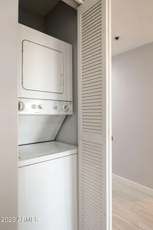 a view of a chairs and table in backyard