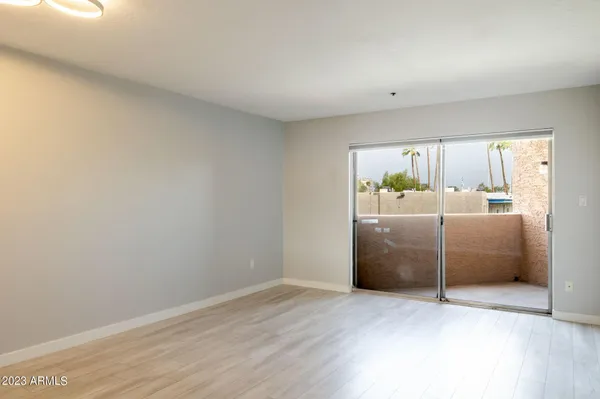 a room with a bed and a window