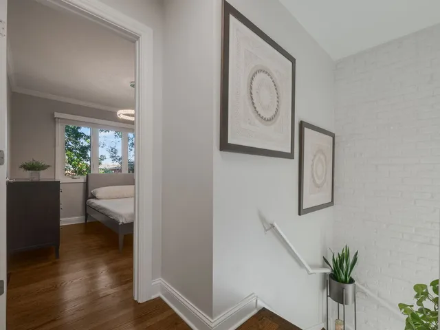 a view of entryway with wooden floor